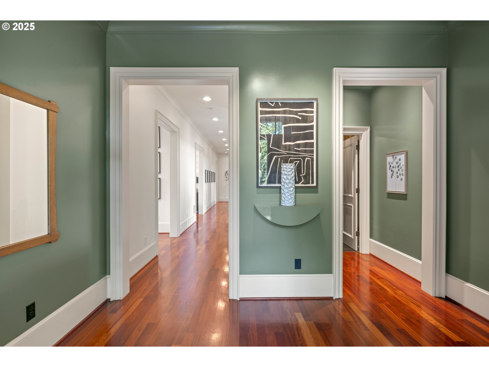 1948 Southwest Terrace Drive Portland, OR 97201 - Photo 2 of 48 a view of a hallway with wooden floor and a living room