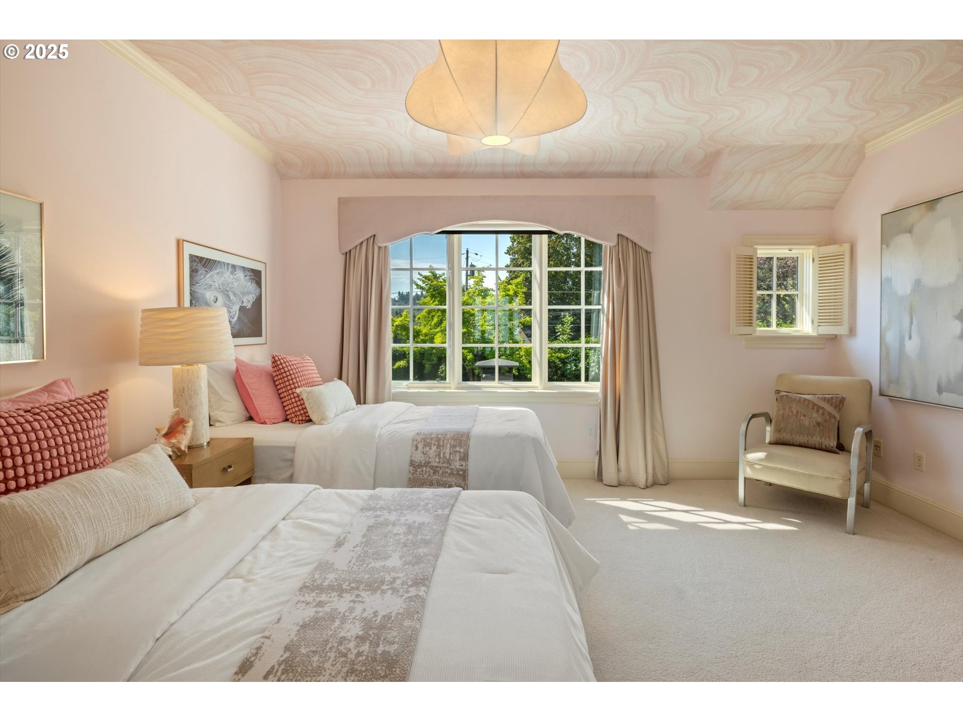 1948 Southwest Terrace Drive Portland, OR 97201 - Photo 23 of 48 a bedroom with a bed and a large window