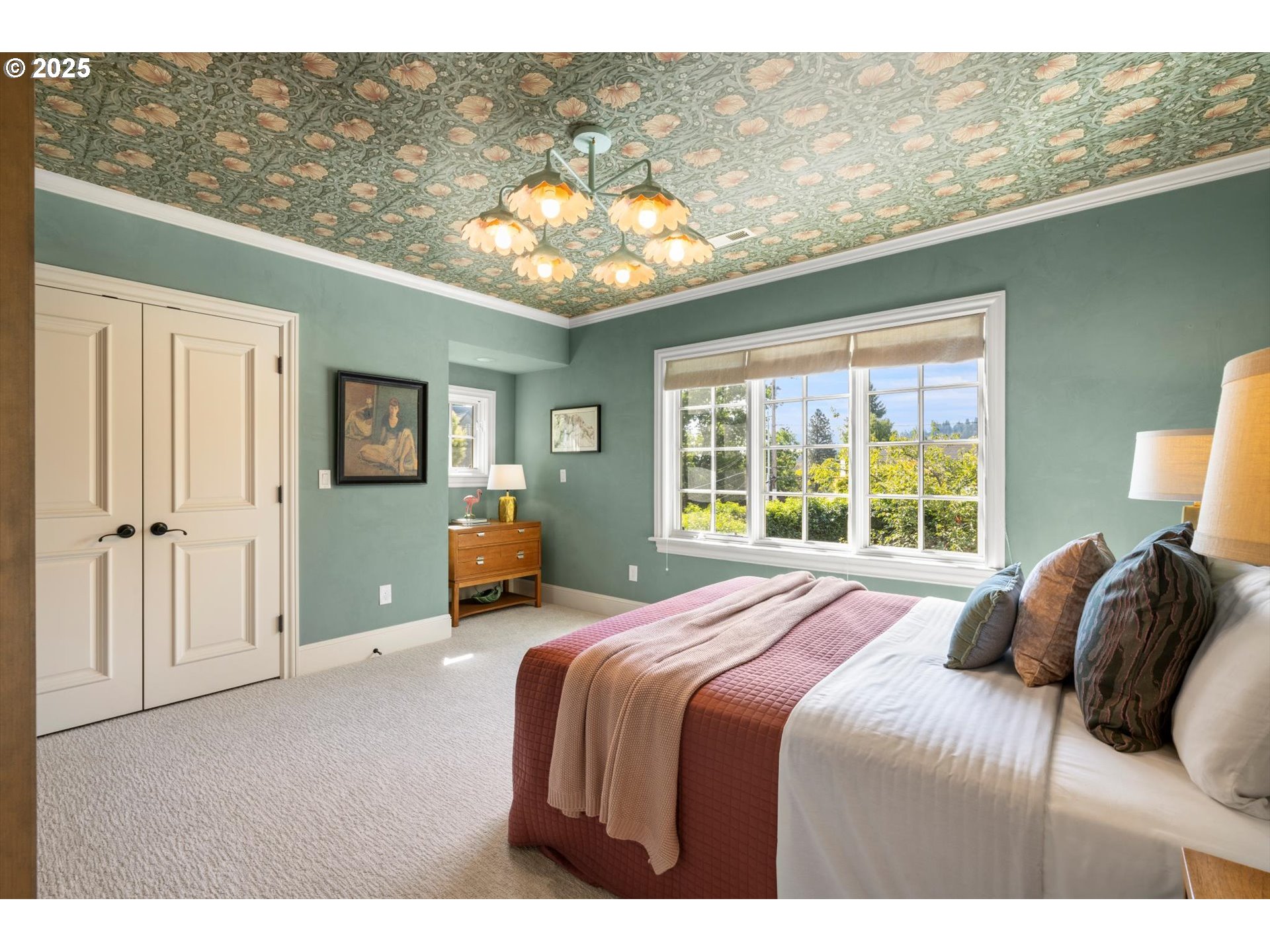 1948 Southwest Terrace Drive Portland, OR 97201 - Photo 24 of 48 a bedroom with a bed and a large window