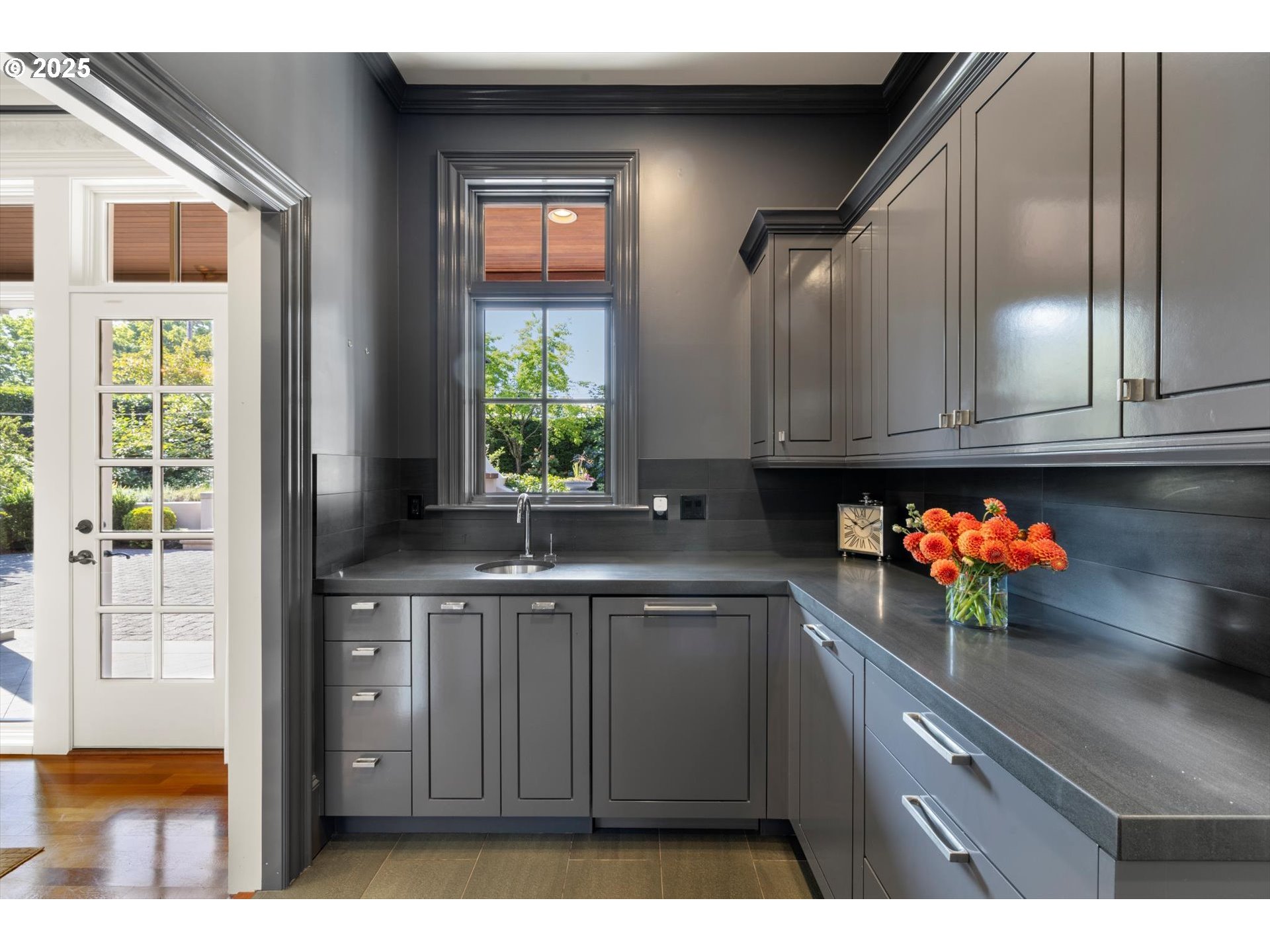 1948 Southwest Terrace Drive Portland, OR 97201 - Photo 6 of 48 a kitchen with a sink cabinets and window