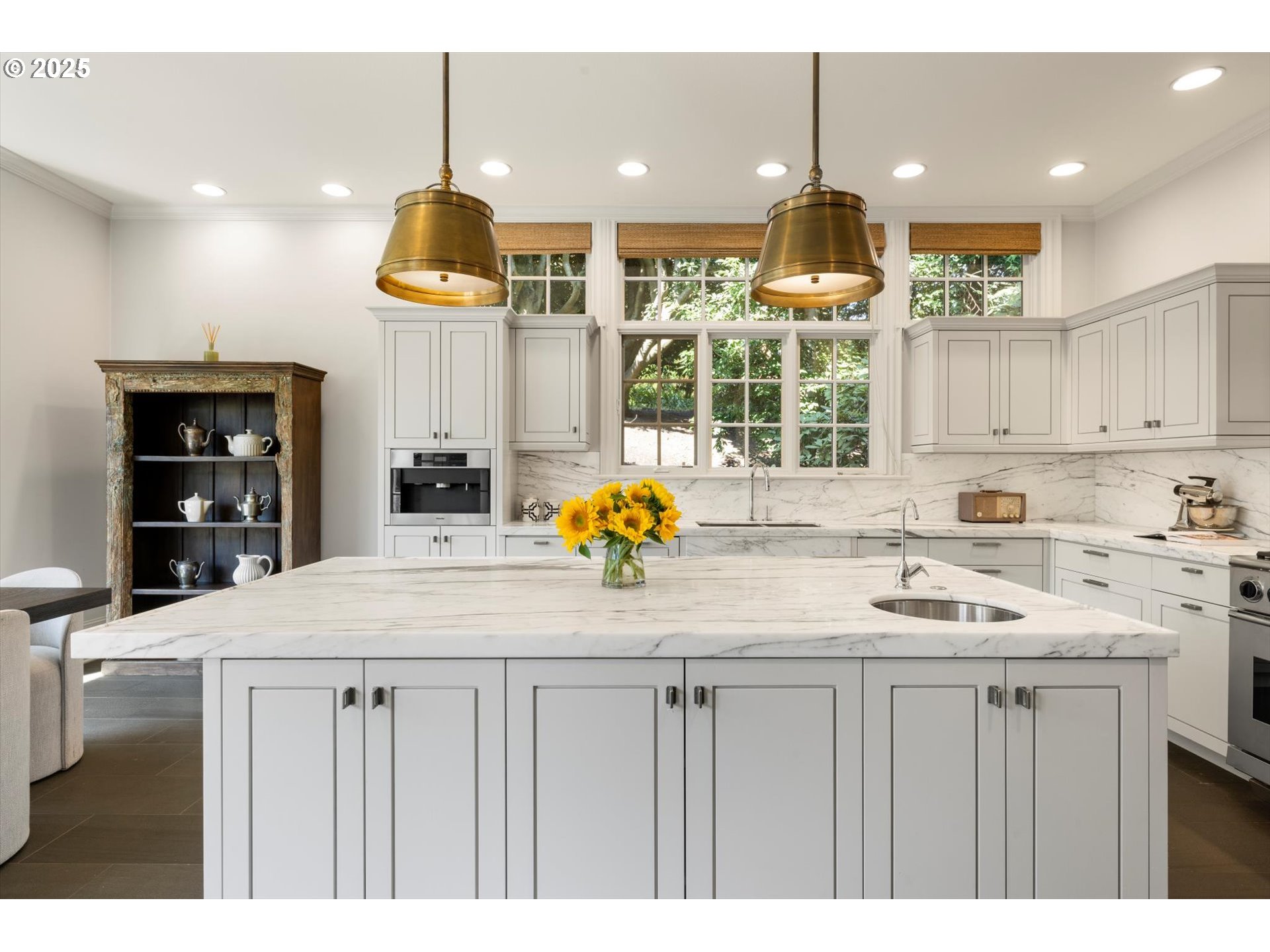 1948 Southwest Terrace Drive Portland, OR 97201 - Photo 8 of 48 a kitchen with a sink a window stainless steel appliances and cabinets