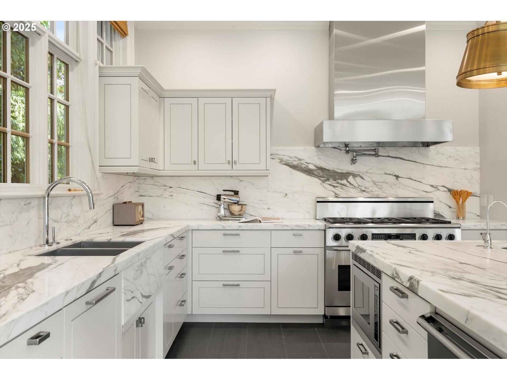 1948 Southwest Terrace Drive Portland, OR 97201 - Photo 9 of 48 a kitchen with appliances cabinets and a sink