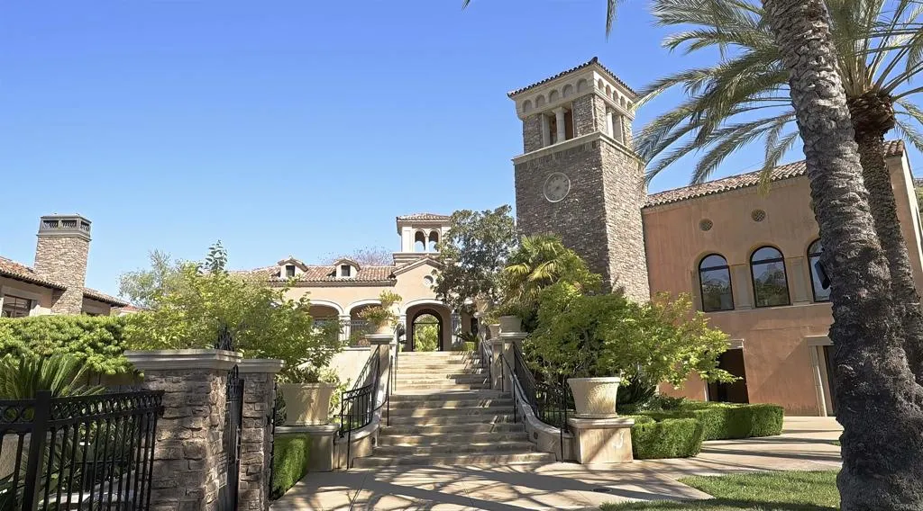 Cielo Rancho Santa Fe, CA 92067 - Photo 15 of 19 a front view of a house with trees