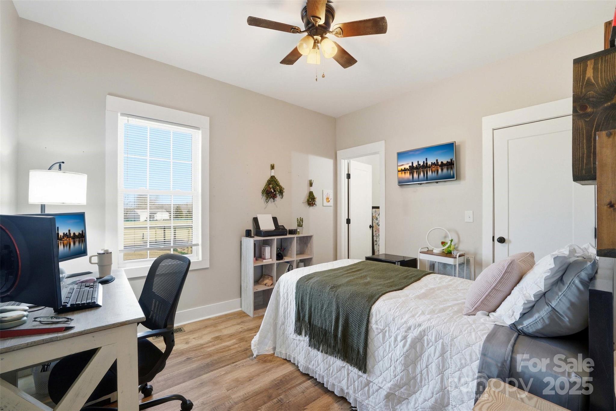 16659 Five Point Road Locust, NC 28097 - Photo 12 of 26 a bedroom with a bed and furniture