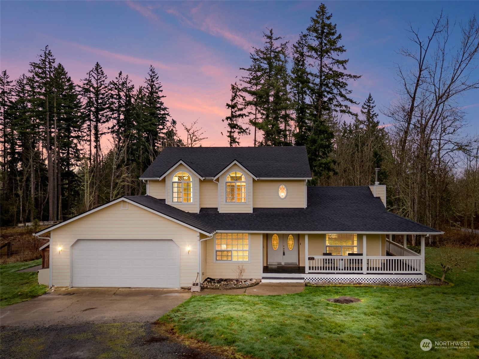 17641 Fennel Road Southeast Yelm, WA 98597 - Photo 1 of 38 a front view of a house with a yard