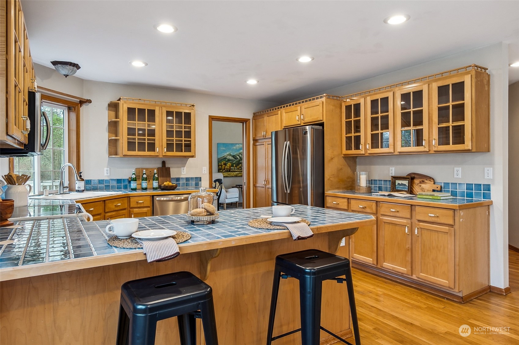 17641 Fennel Road Southeast Yelm, WA 98597 - Photo 14 of 38 a large kitchen with dining table and chairs