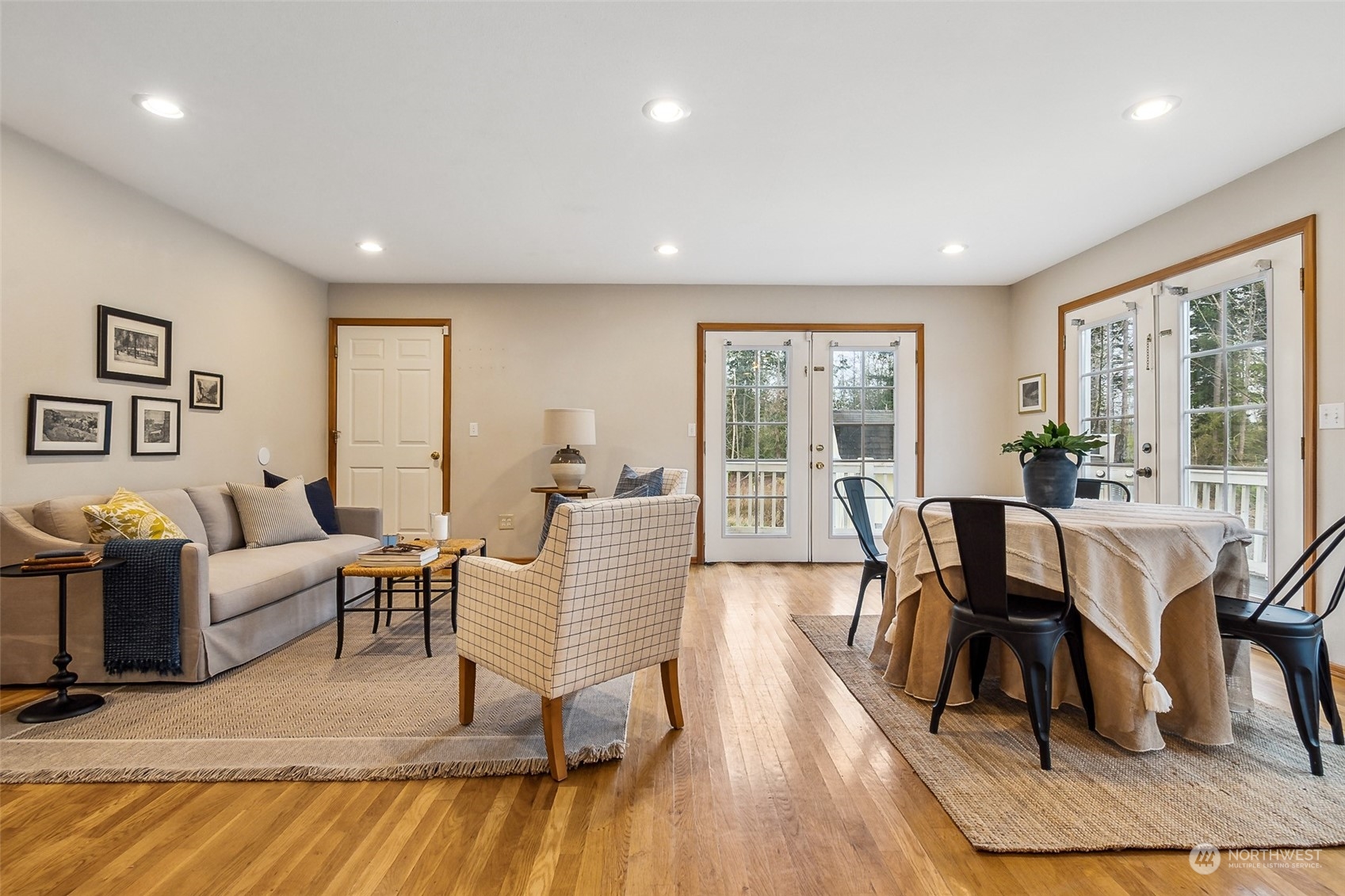17641 Fennel Road Southeast Yelm, WA 98597 - Photo 18 of 38 a living room with furniture and a wooden floor