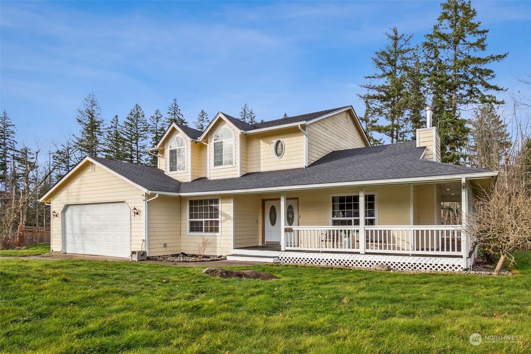 17641 Fennel Road Southeast Yelm, WA 98597 - Photo 2 of 38 front view of a house with a yard