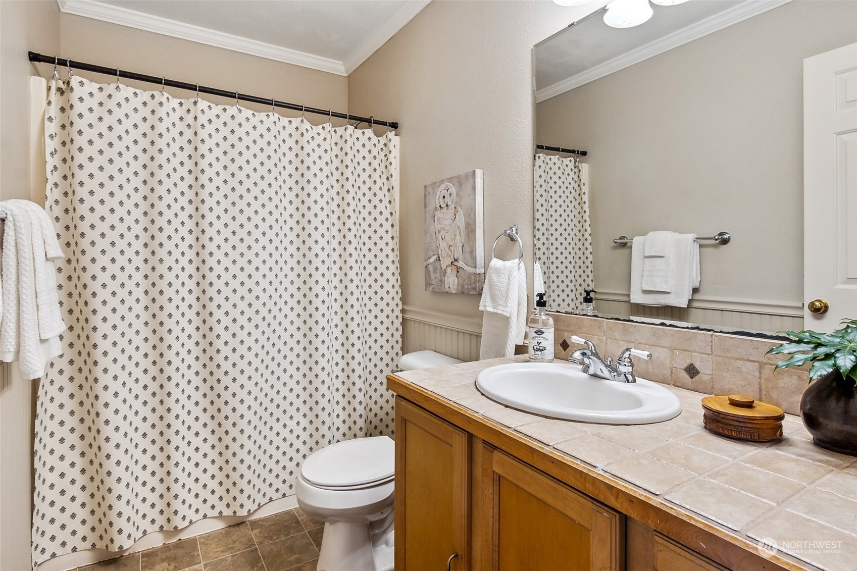 17641 Fennel Road Southeast Yelm, WA 98597 - Photo 28 of 38 a bathroom with a sink toilet and a mirror
