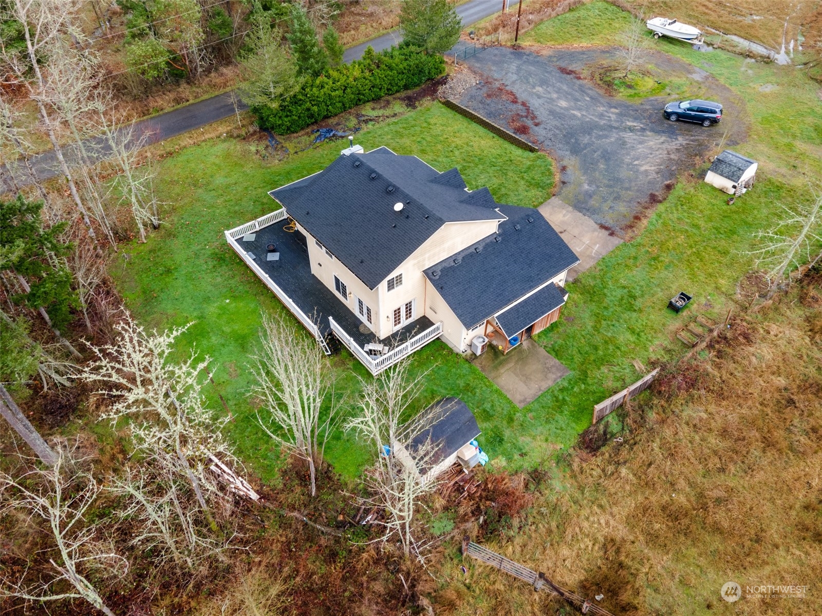 17641 Fennel Road Southeast Yelm, WA 98597 - Photo 31 of 38 an aerial view of a house with a garden