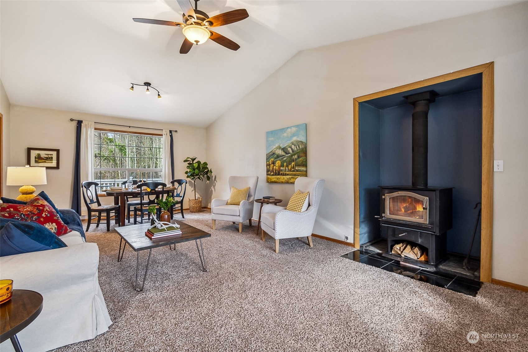 17641 Fennel Road Southeast Yelm, WA 98597 - Photo 7 of 38 a living room with furniture and a window