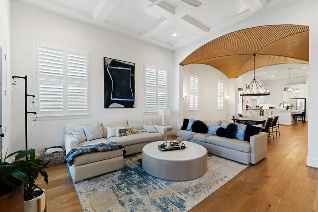 a living room with furniture and a table