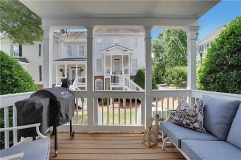 a view of a porch with a bench