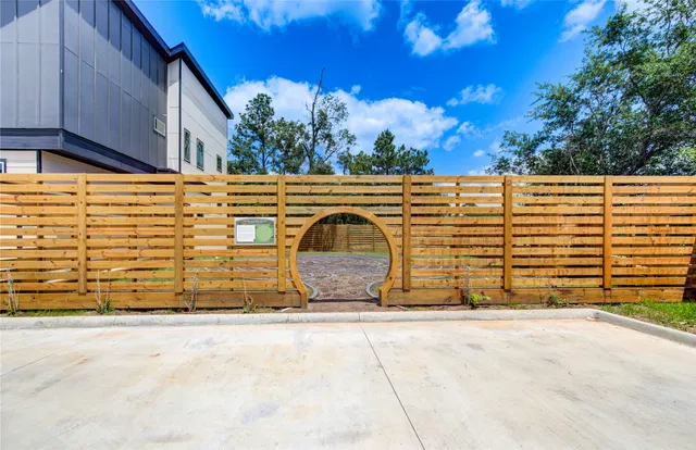 a view of a backyard with sitting area