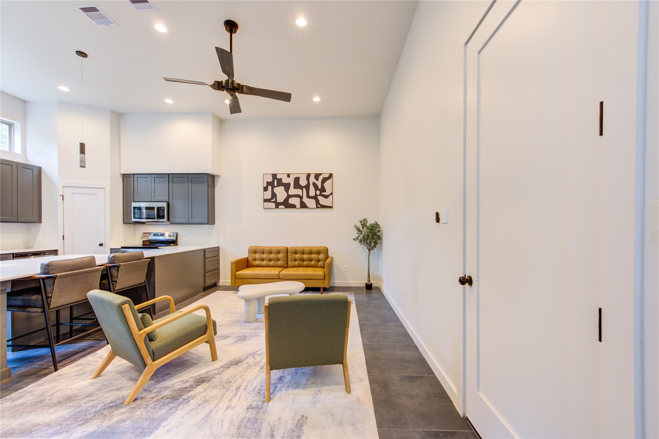 13102 Honey Suckle Ridge Lane Cypress, TX 77429 - Photo 48 of 48 a living room with furniture and a flat screen tv