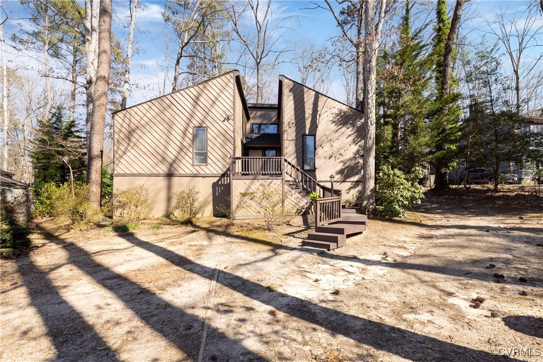 a view of a house with a snow on the road