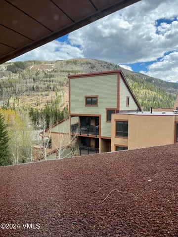 a view of house with outdoor space