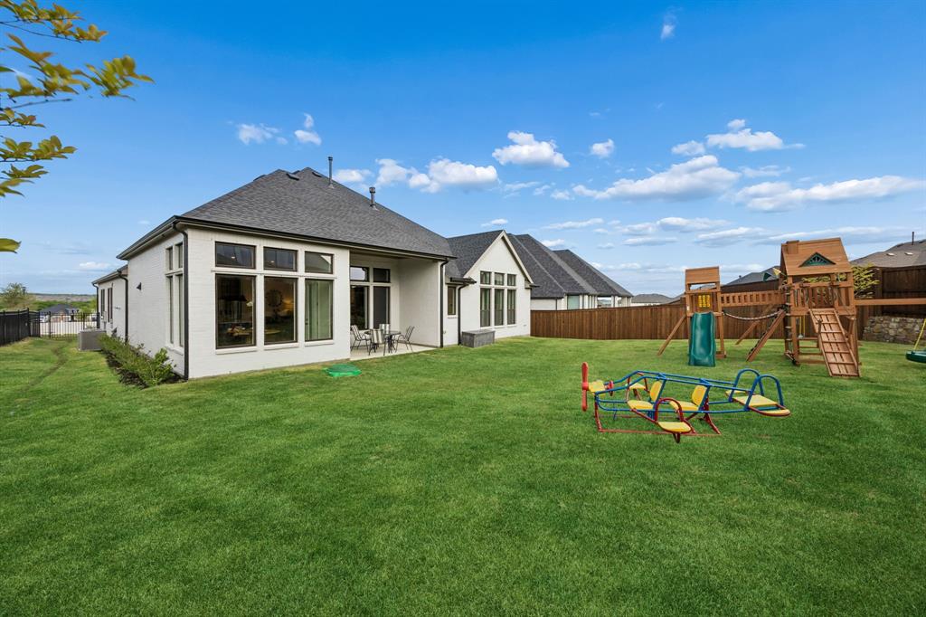 1717 Tolleson Drive Fort Worth, TX 76008 - Photo 32 of 40 Play set conveys with the home