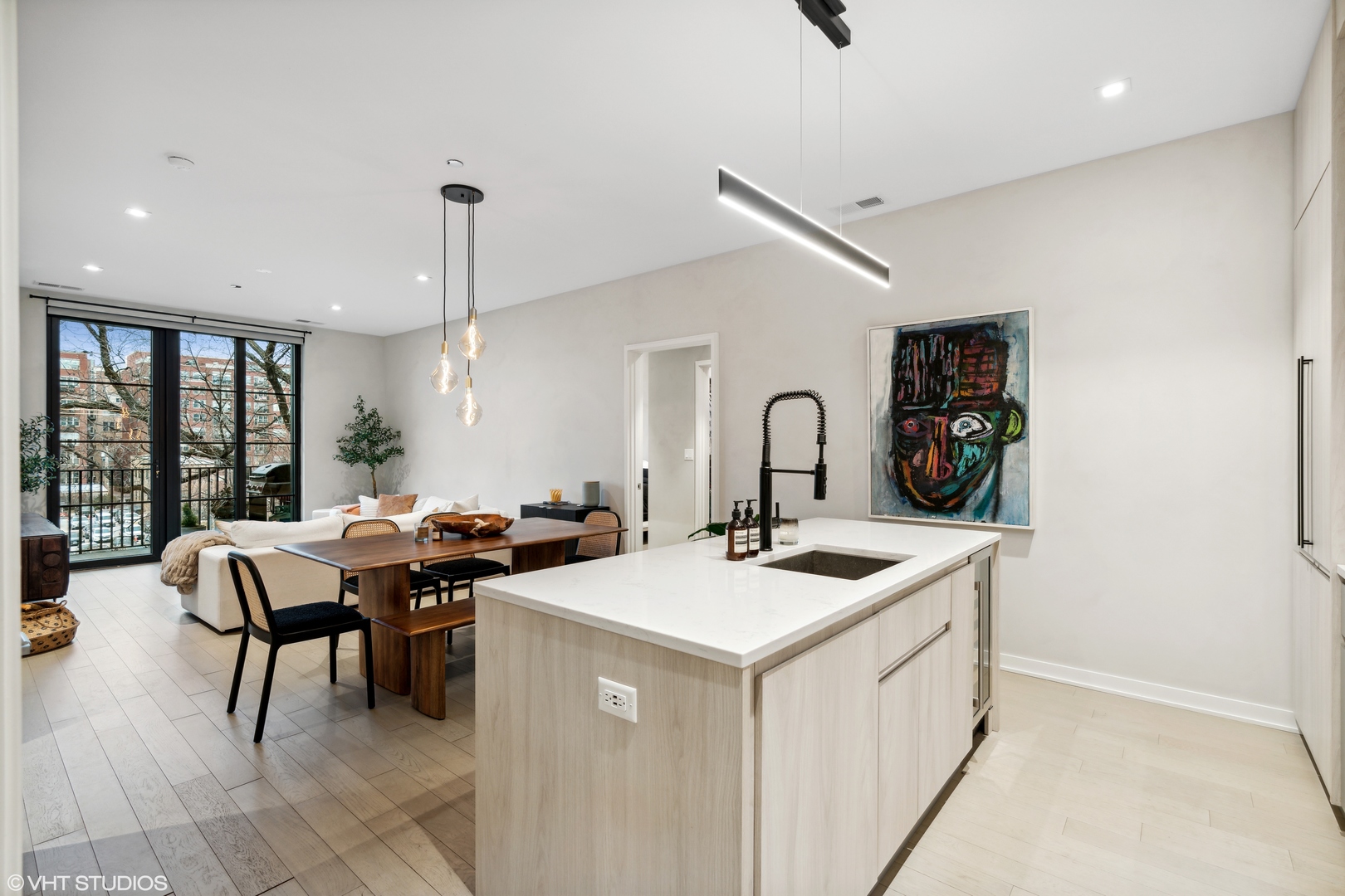 1400 West Monroe Street, Unit 4C Chicago, IL 60607 - Photo 5 of 15 a room with furniture a large window and a rug