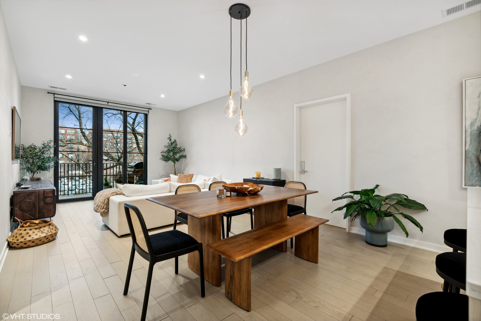 1400 West Monroe Street, Unit 4C Chicago, IL 60607 - Photo 6 of 15 a view of a livingroom with furniture and a potted plant