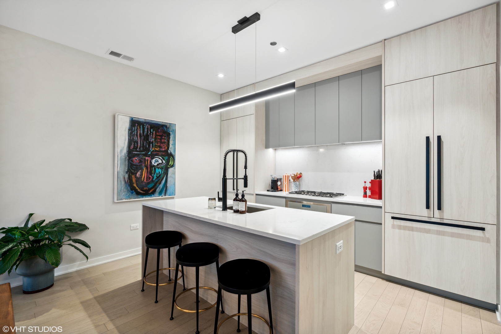 1400 West Monroe Street, Unit 4C Chicago, IL 60607 - Photo 8 of 15 a kitchen with stainless steel appliances a sink and a refrigerator