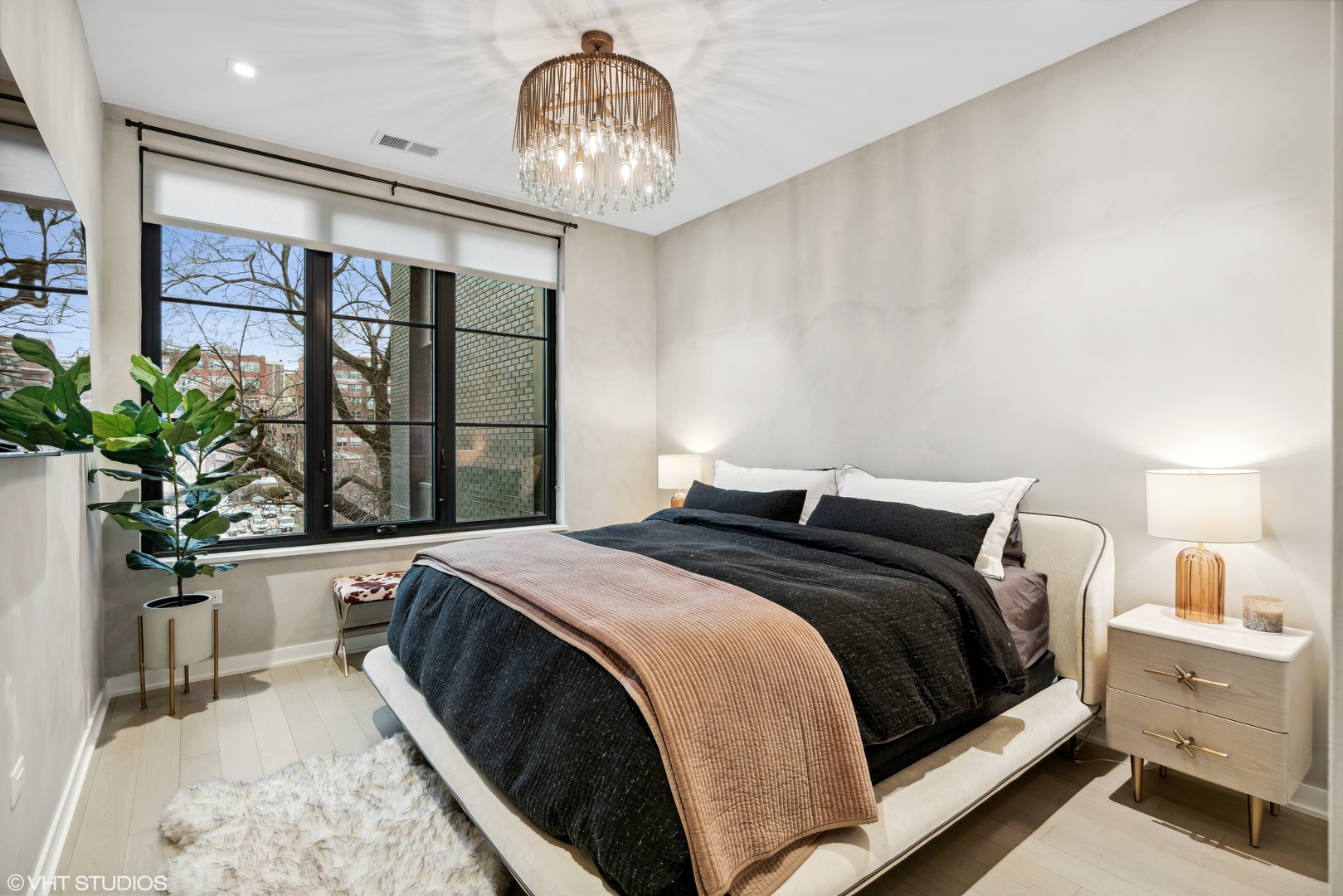 1400 West Monroe Street, Unit 4C Chicago, IL 60607 - Photo 9 of 15 a bedroom with a large bed and a large window