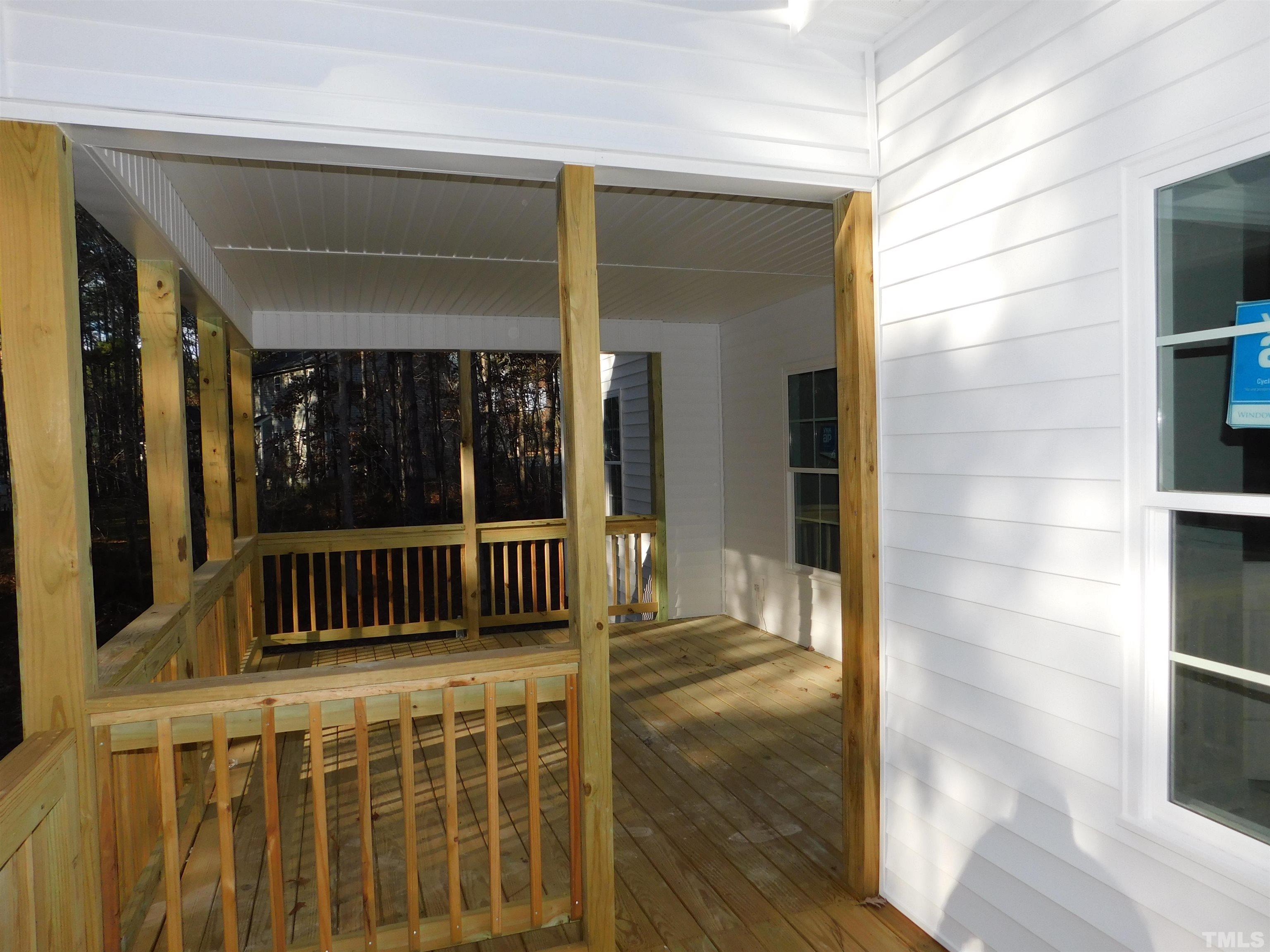 85 Yancey Road Zebulon, NC 27597 - Photo 5 of 10 a view of deck with a black gate