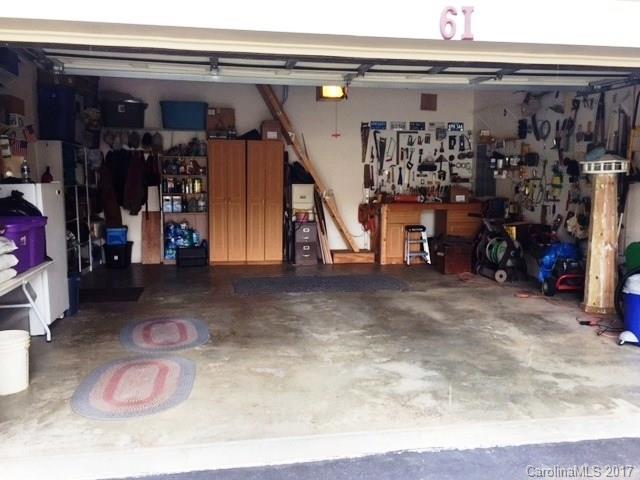 61 Bowman Ridge Road, Unit 5 Hendersonville, NC 28739 - Photo 24 of 24 a view of a garage with rack