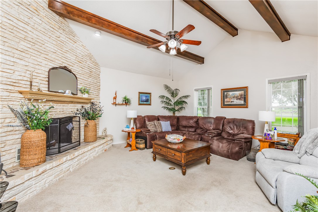 345 Trail Ridge Drive Sandia, TX 78383 - Photo 23 of 40 a living room with furniture and a fireplace