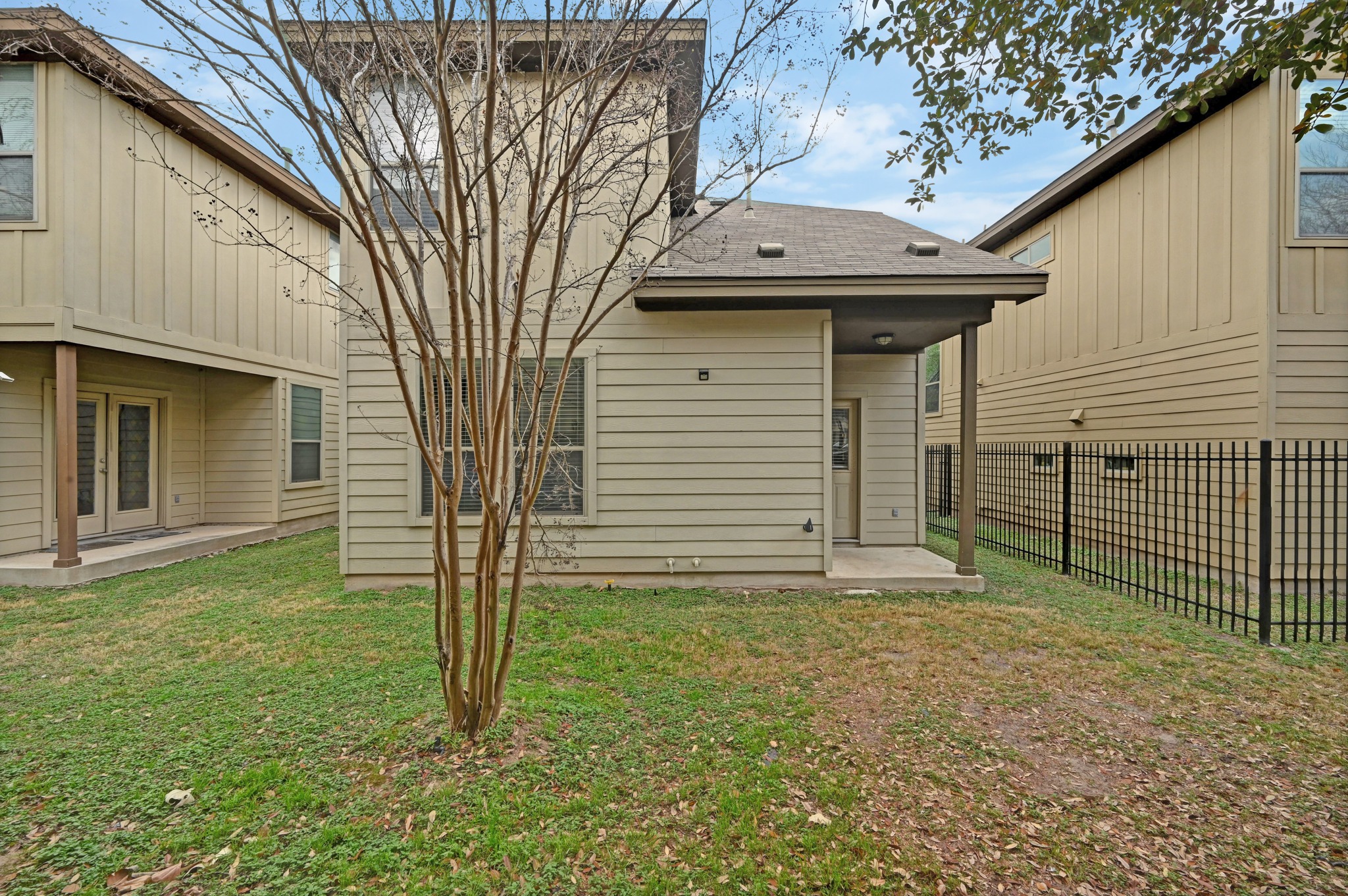 2101 Rivers Edge Way, Unit 32 Austin, TX 78741 - Photo 22 of 24 Fence in your space for a new puppy, or keep it open for a larger yardspace.