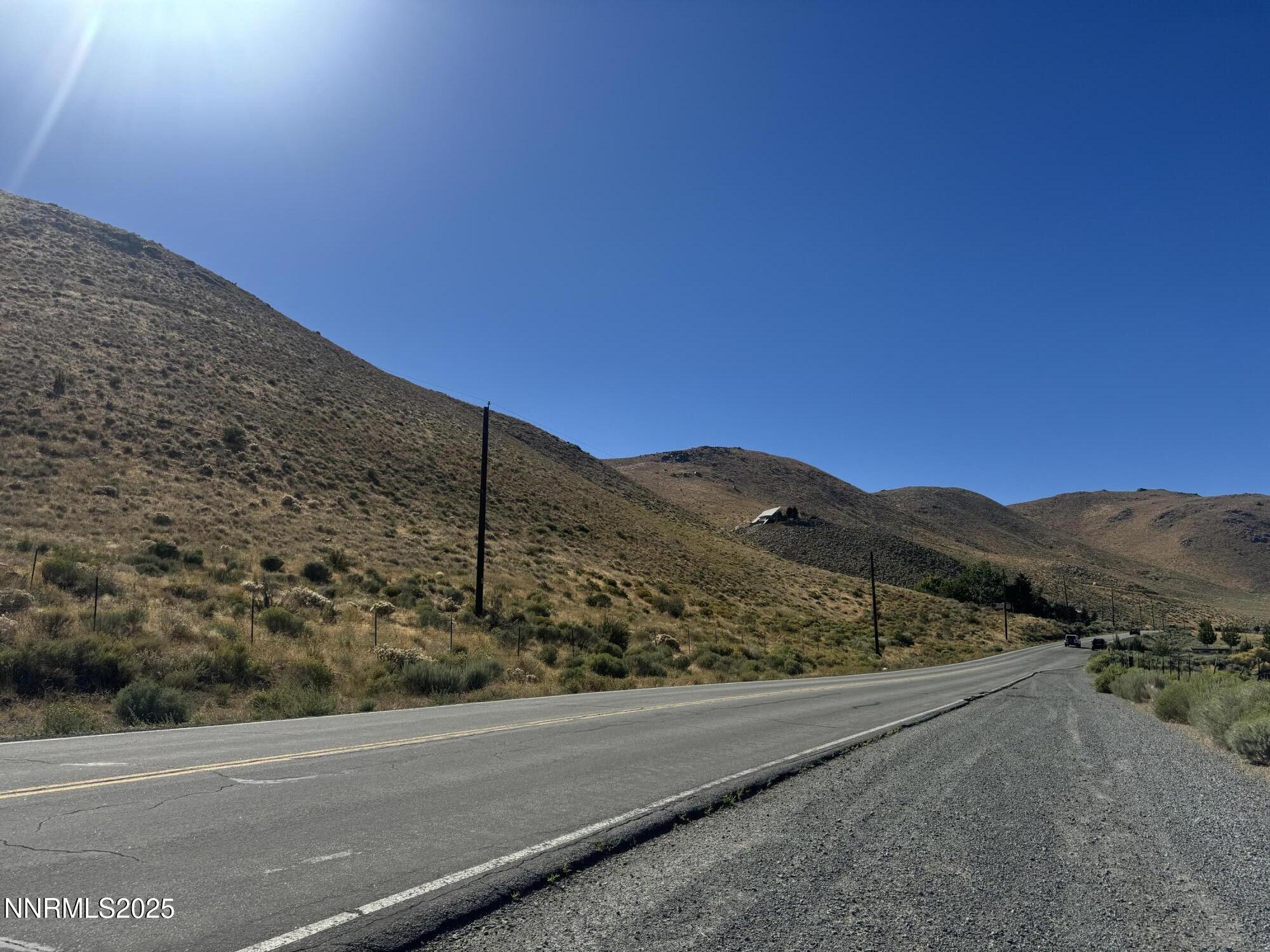 9500 North Red Rock Road Reno, NV 89508 - Photo 13 of 16 a view of a road with a mountain view