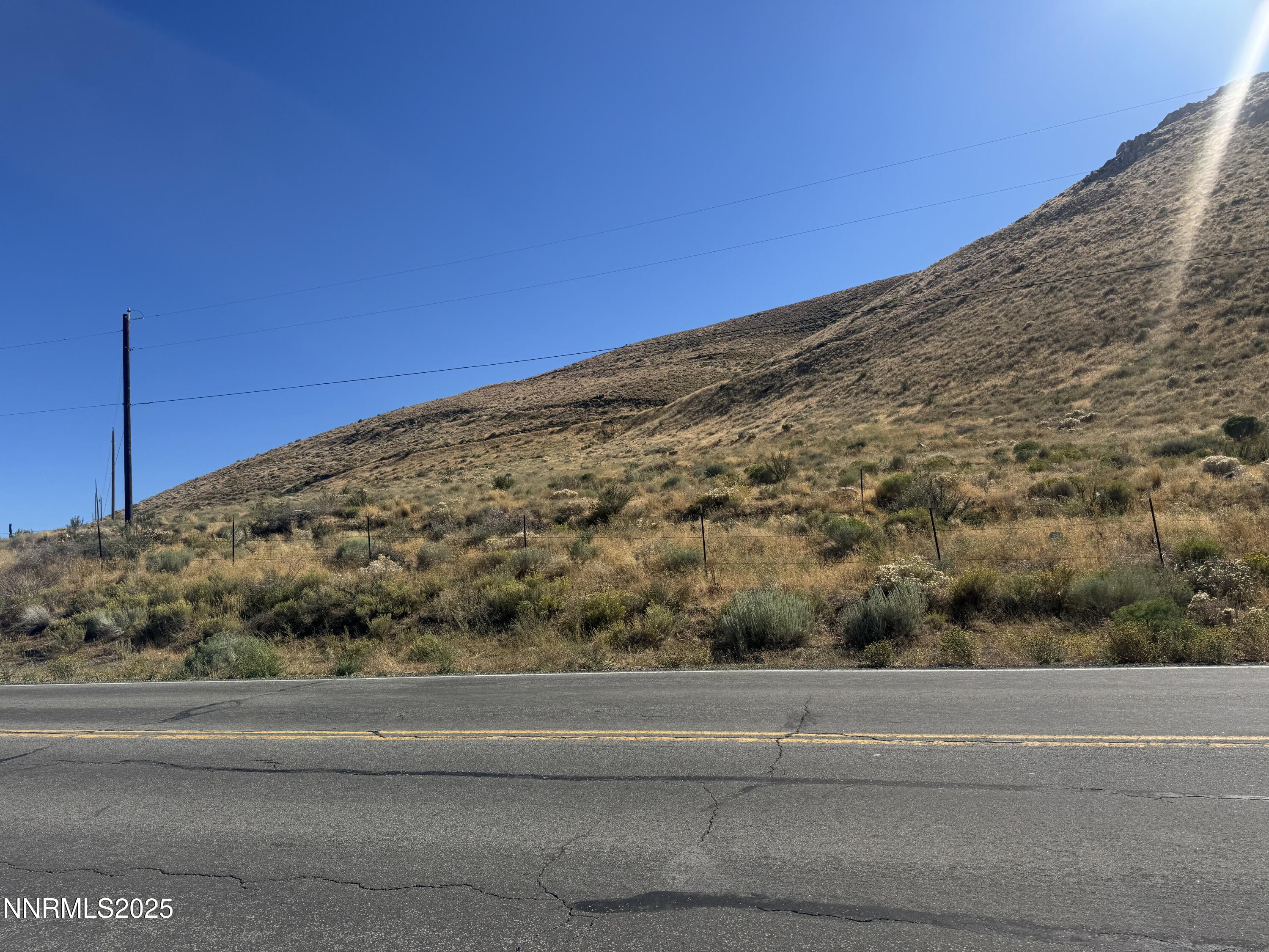 9500 North Red Rock Road Reno, NV 89508 - Photo 16 of 16 a view of a road with a yard