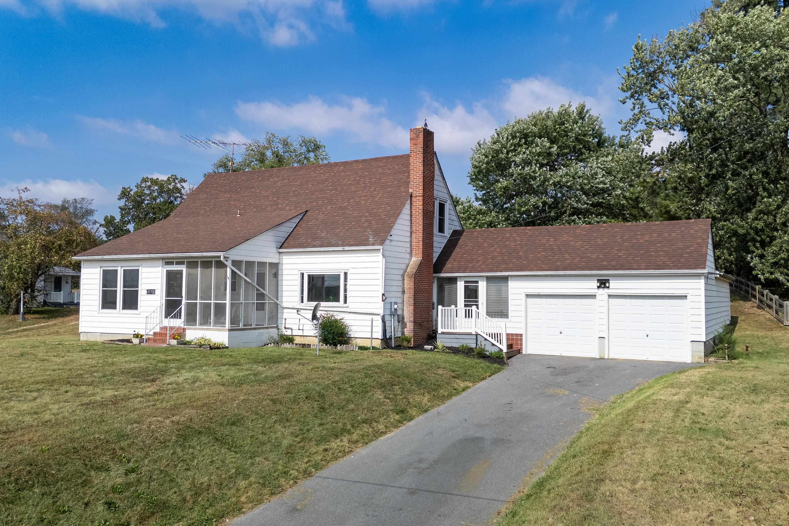 3138 Cross Keys Road Harrisonburg, VA 22801 - Photo 53 of 74 The front view of the home located at 3138 Cross Keys Road. This home featutres a two car garage, large driveway for parking, screened porch, and front porch space. This home features a large lot and much more!