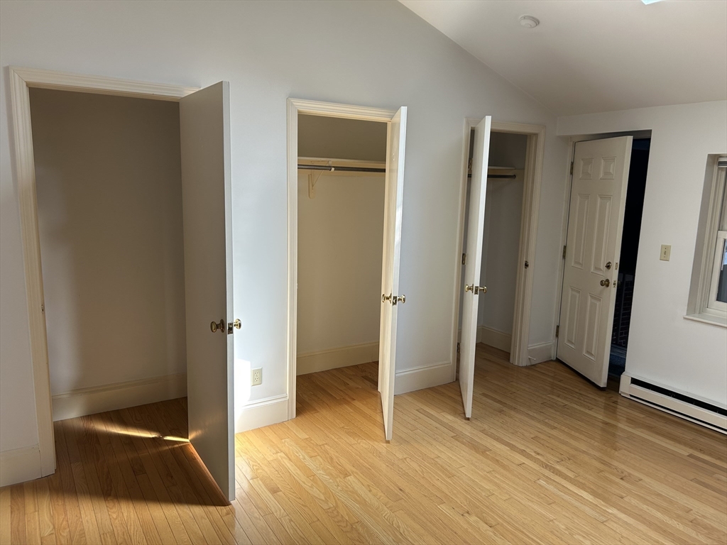 31 Branch Boston Ma, Unit 2 Boston, MA 02108 - Photo 6 of 11 a view of a livingroom with wooden floor and closet