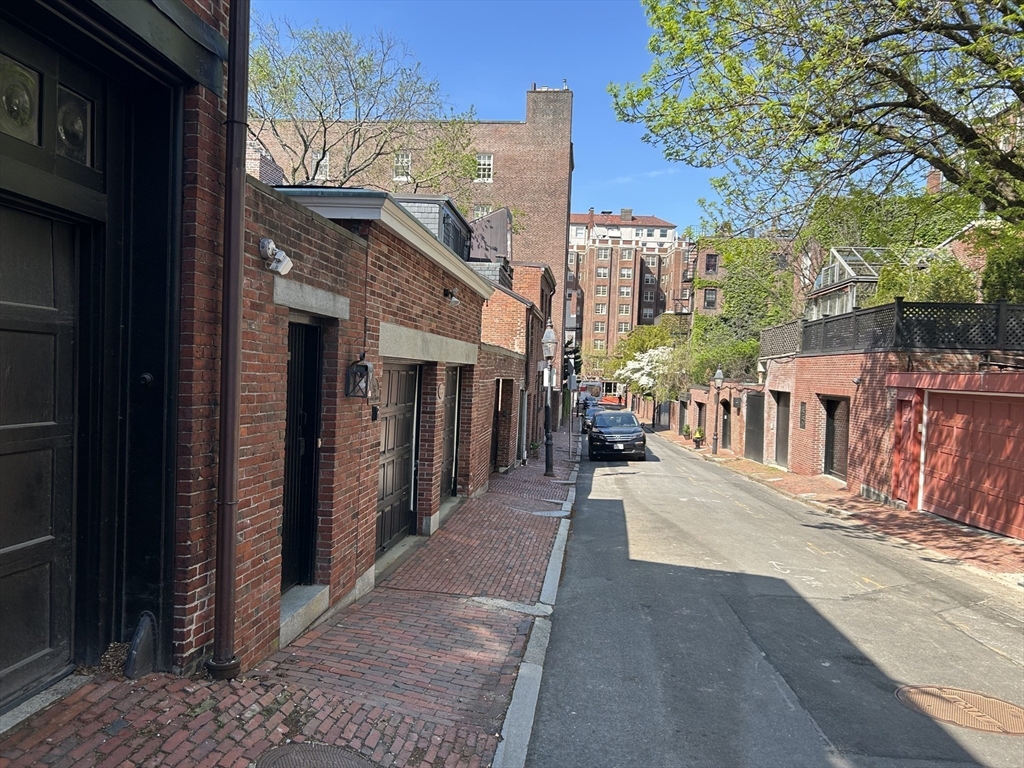 31 Branch Boston Ma, Unit 2 Boston, MA 02108 - Photo 9 of 11 a view of a street with buildings