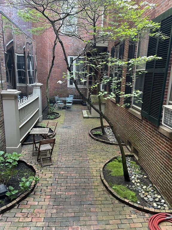 31 Branch Boston Ma, Unit 2 Boston, MA 02108 - Photo 10 of 11 a view of a backyard with sitting area