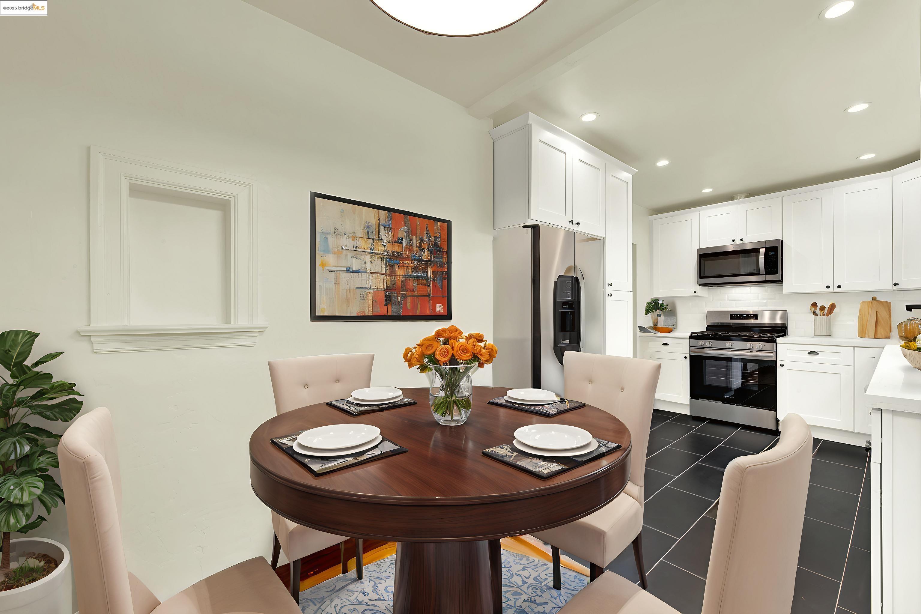 971 34th Street Richmond, CA 94805 - Photo 17 of 58 Dining area with recessed lighting and dark tile patterned flooring