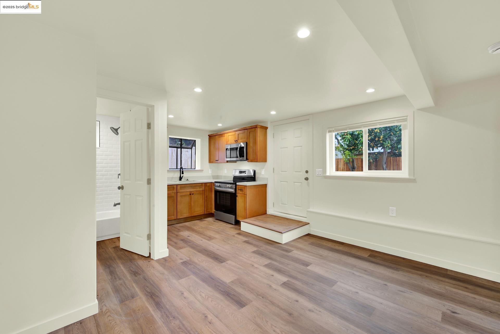 971 34th Street Richmond, CA 94805 - Photo 48 of 58 Kitchen with stainless steel appliances, plenty of natural light, light wood-type flooring, light countertops, and recessed lighting