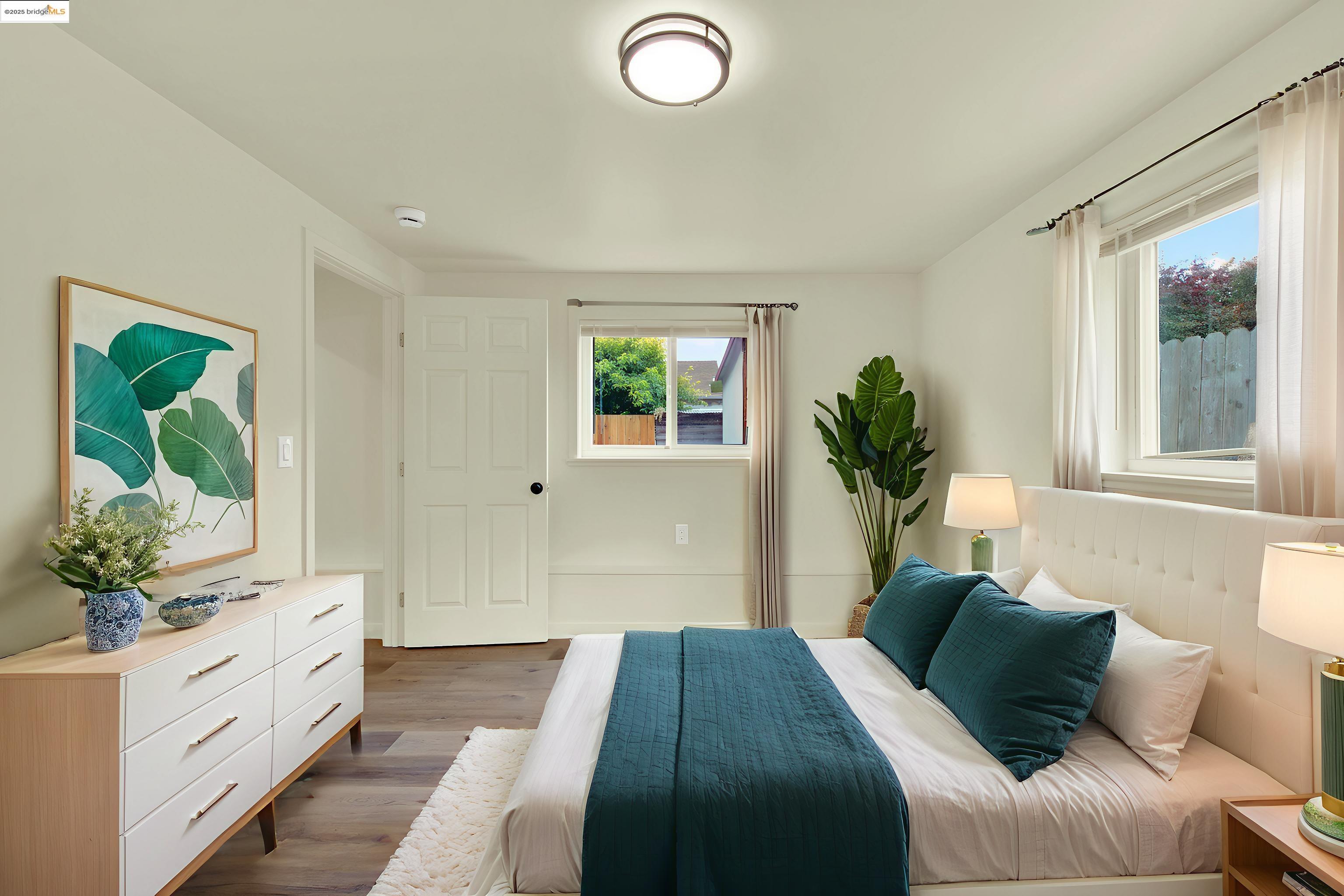 971 34th Street Richmond, CA 94805 - Photo 54 of 58 Bedroom with wood finished floors