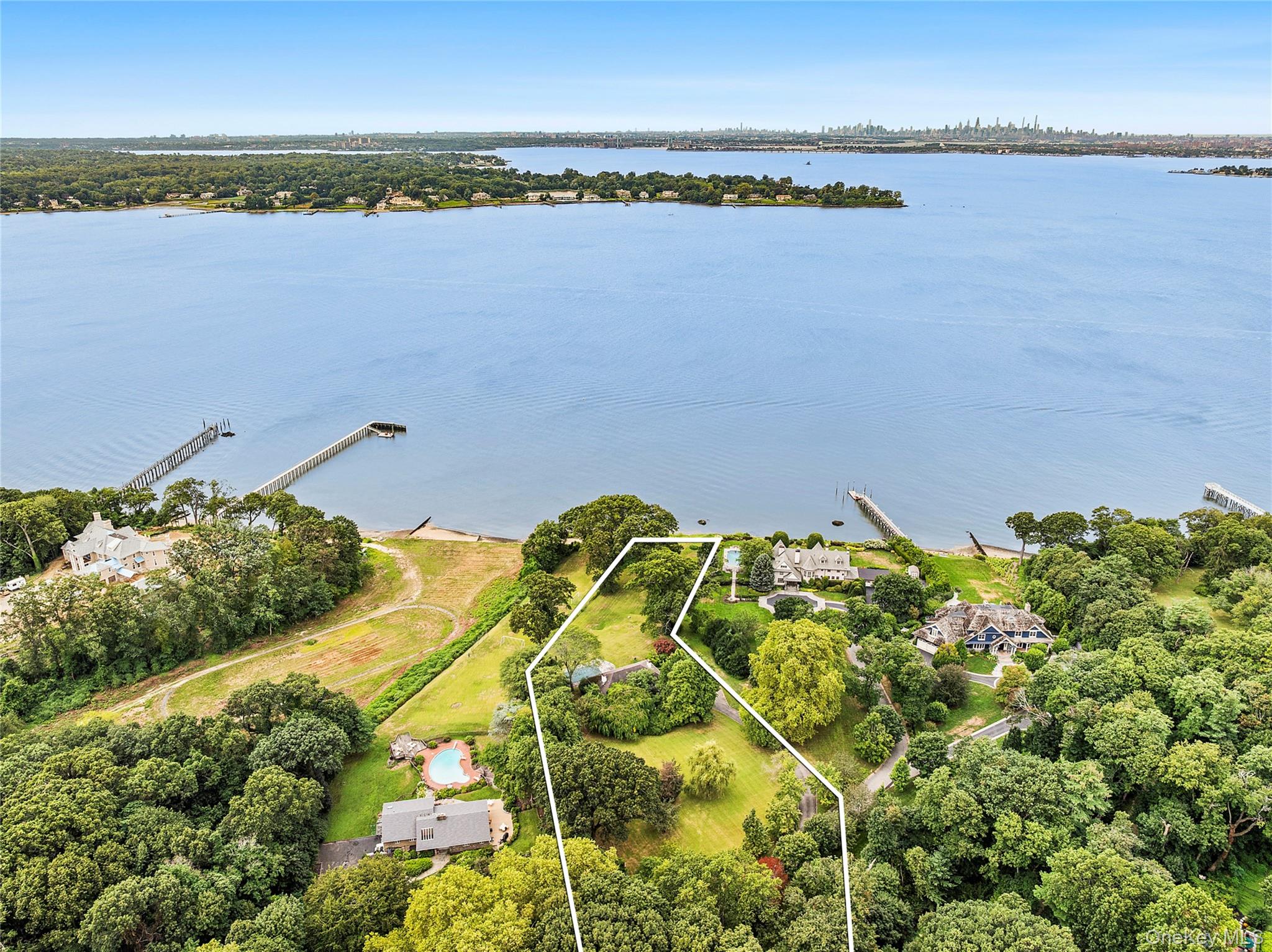 45 Cedar Lane Sands Point, NY 11050 - Photo 2 of 18 a view of a lake