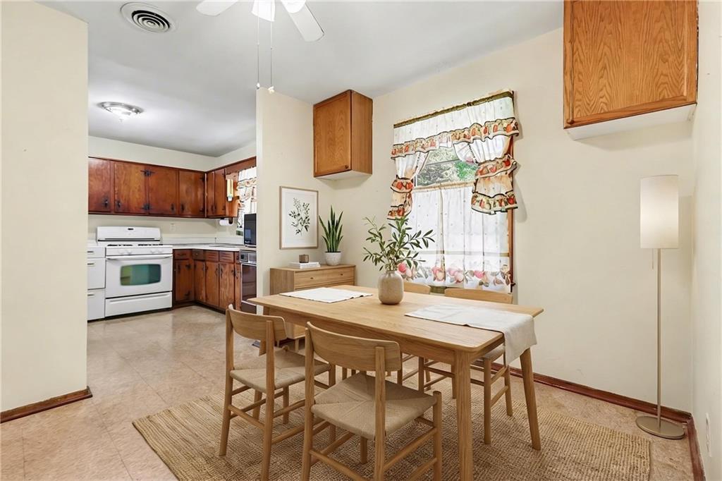 7019 Lake View Lane Doraville, GA 30360 - Photo 9 of 32 a view of kitchen with furniture and wooden floor
