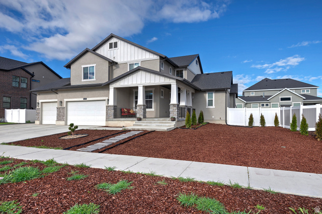 11694 Engelmann Drive Draper, UT 84020 - Photo 39 of 41 Craftsman inspired home featuring a porch, driveway, stucco siding, and stone siding