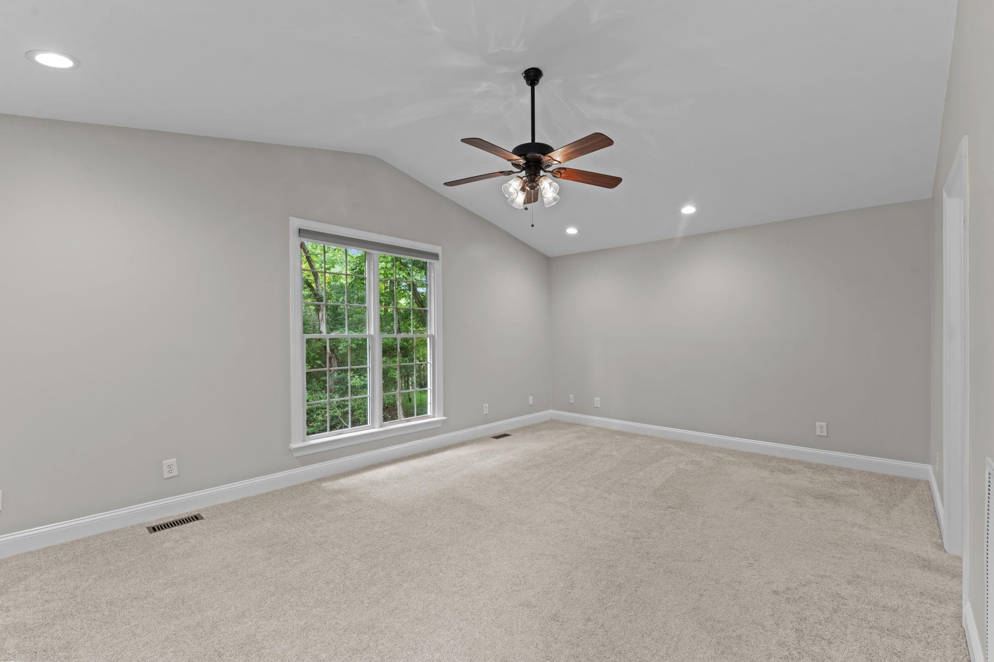 409 Husketh Road Youngsville, NC 27596 - Photo 13 of 29 an empty room with a window