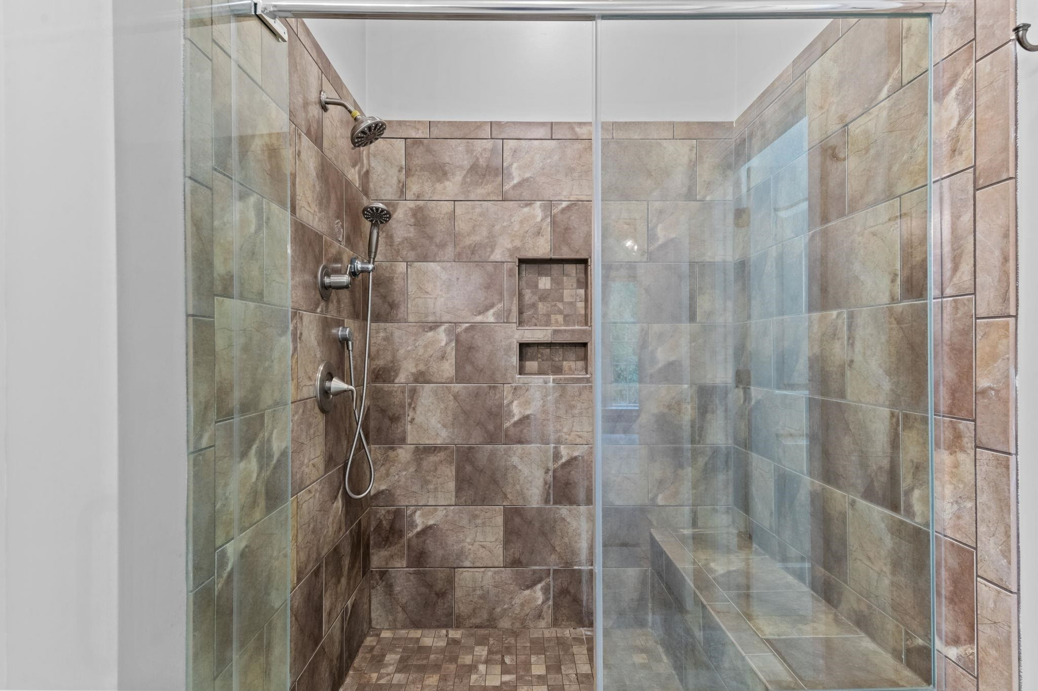409 Husketh Road Youngsville, NC 27596 - Photo 16 of 29 a bathroom with a shower