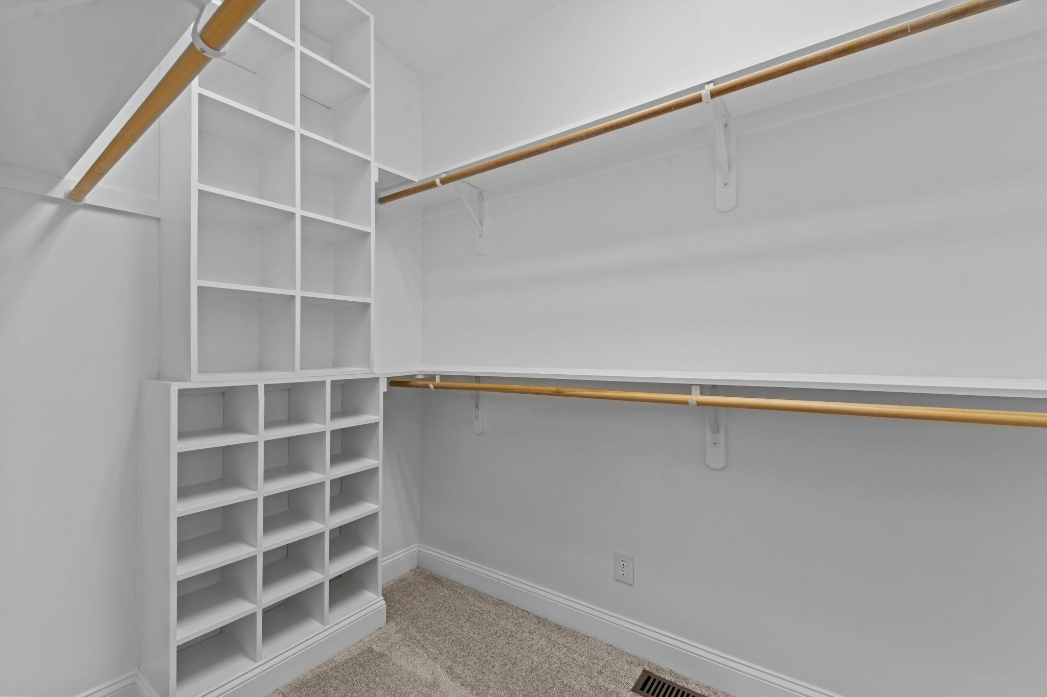 409 Husketh Road Youngsville, NC 27596 - Photo 17 of 29 a view of an empty walk in closet