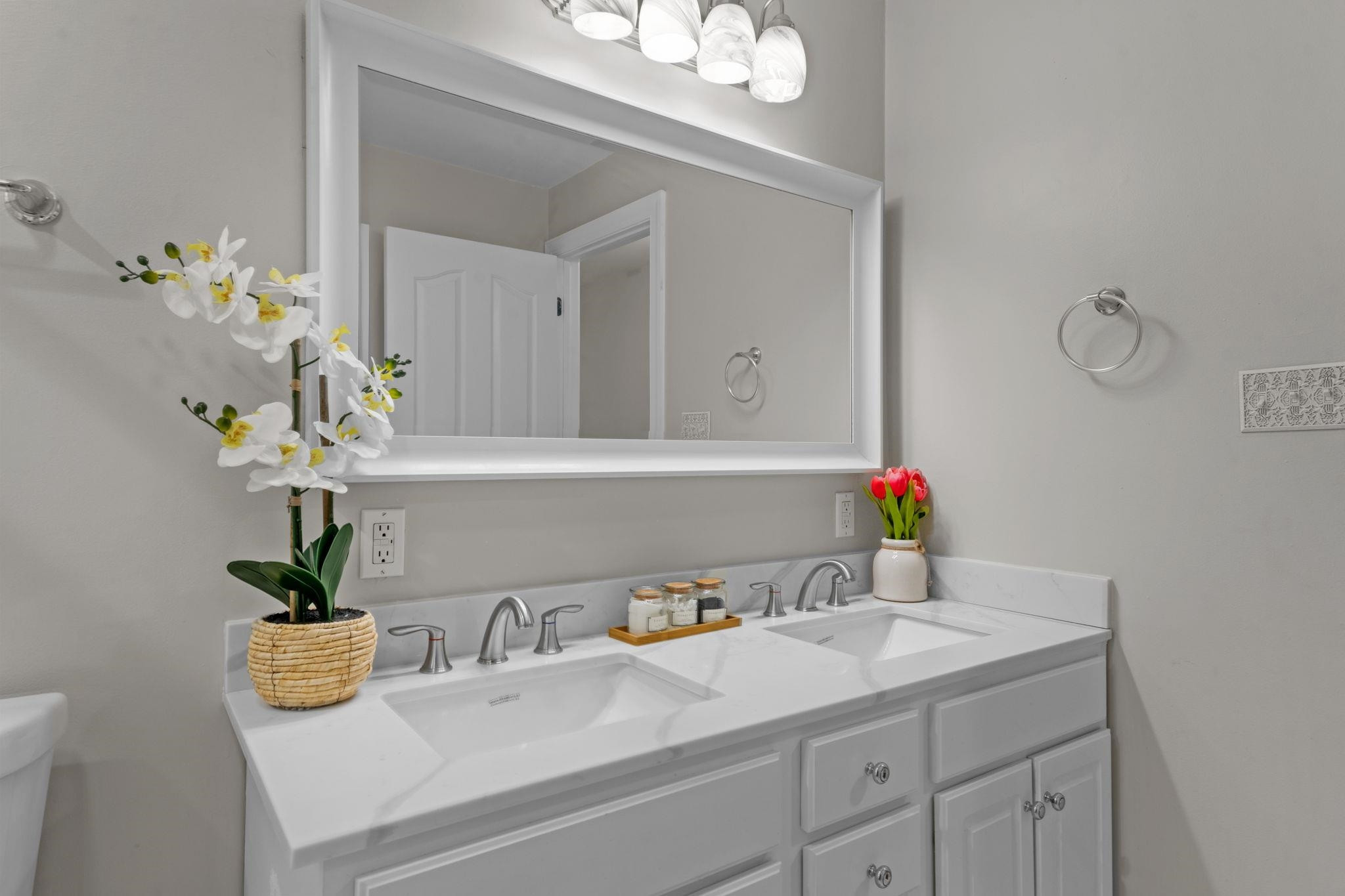 409 Husketh Road Youngsville, NC 27596 - Photo 21 of 29 a bathroom with a sink a vanity and a mirror