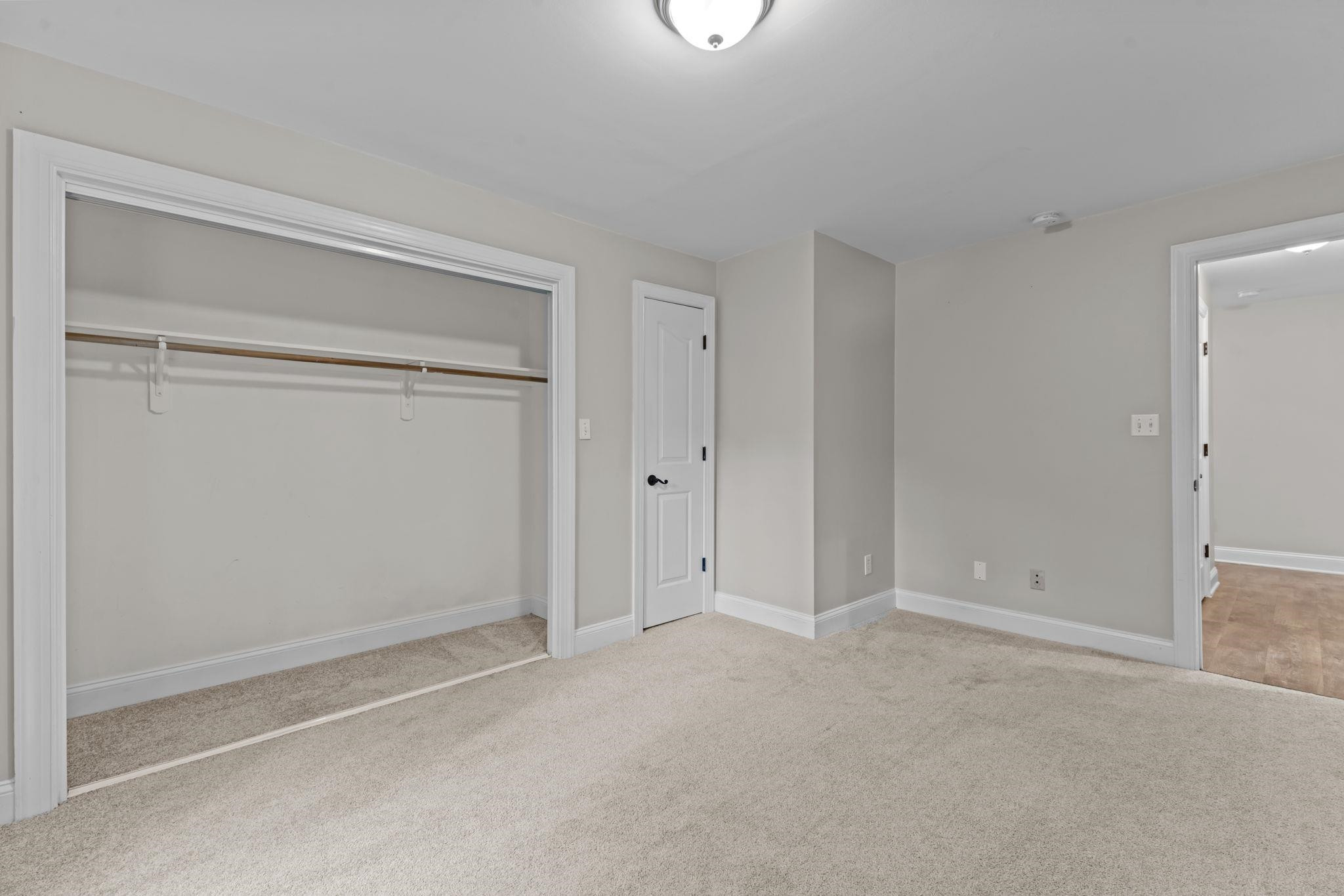 409 Husketh Road Youngsville, NC 27596 - Photo 23 of 29 a view of an empty room