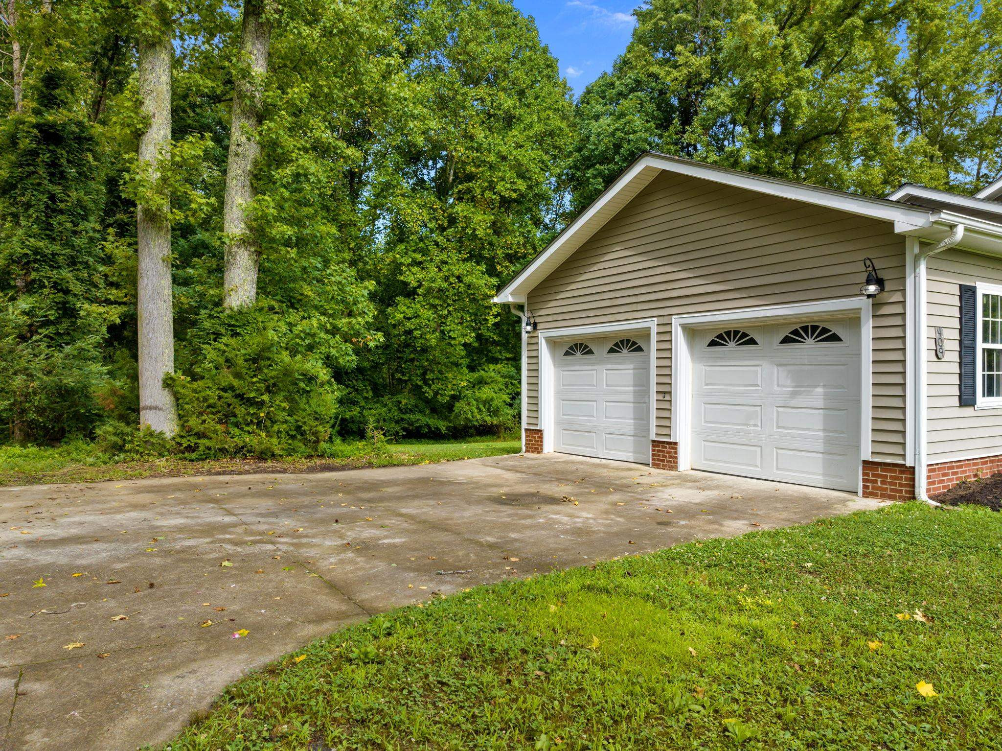 409 Husketh Road Youngsville, NC 27596 - Photo 25 of 29 a front view of house with yard and green space