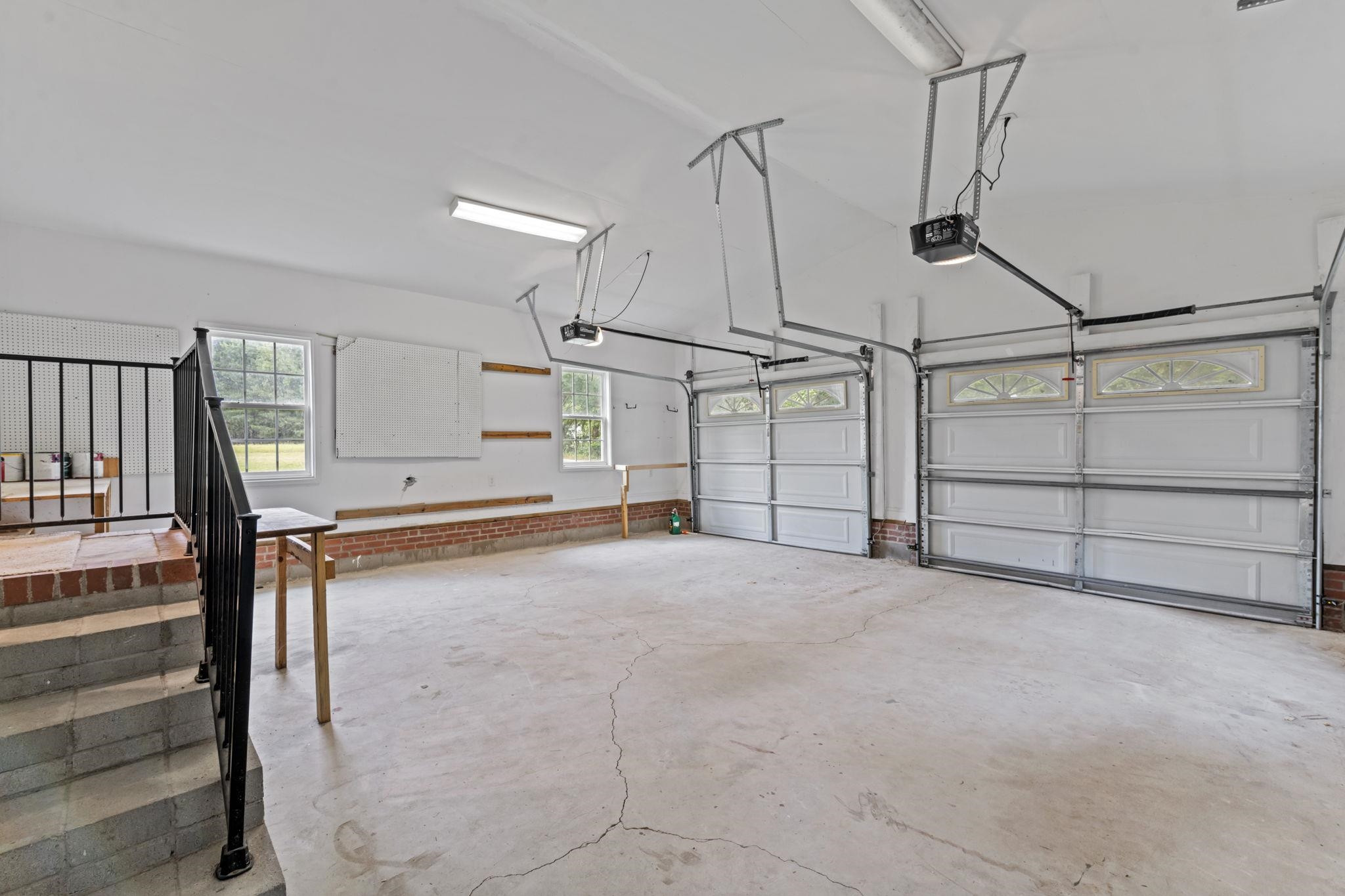 409 Husketh Road Youngsville, NC 27596 - Photo 26 of 29 a view of a garage with wooden floor