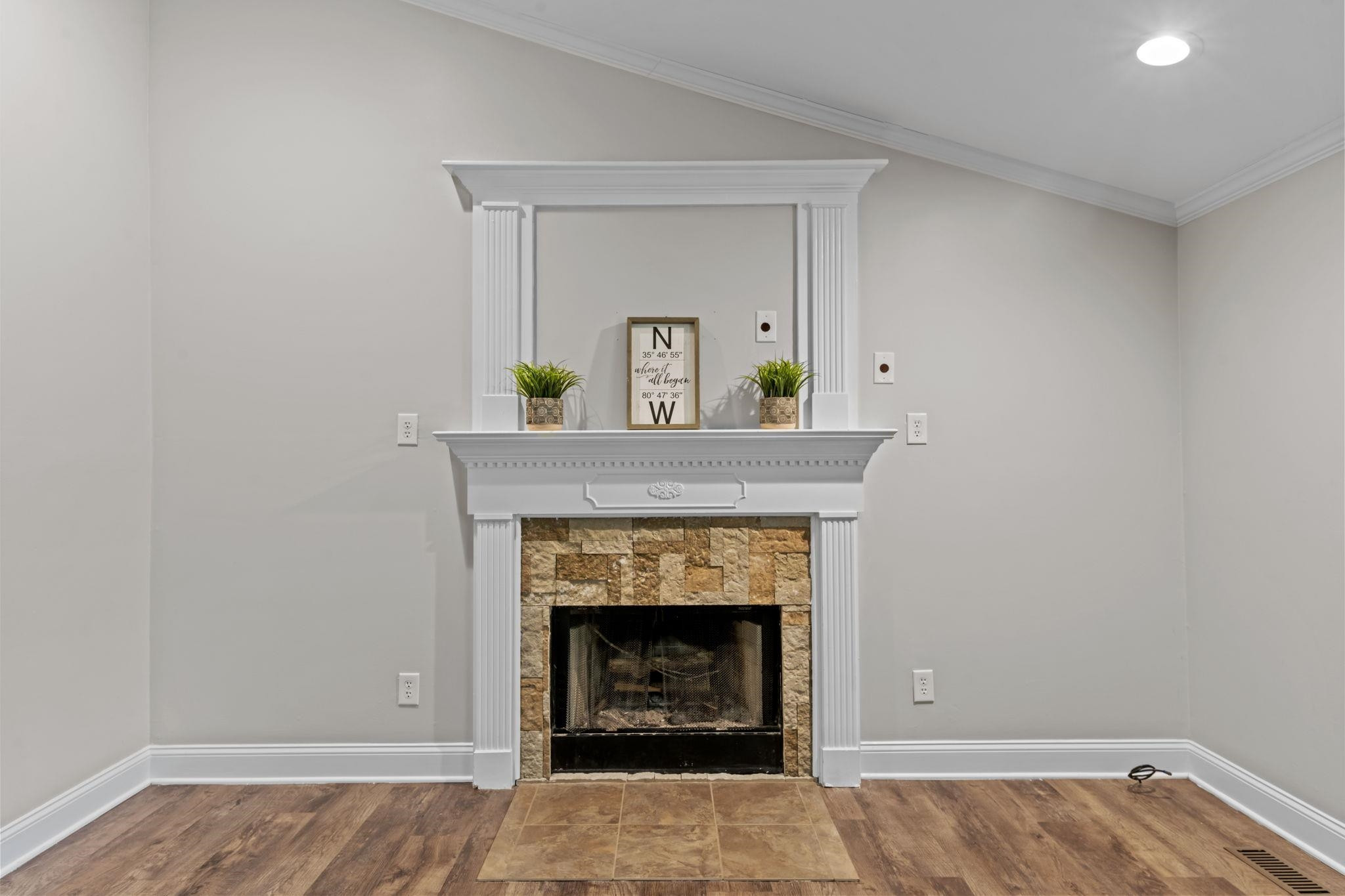 409 Husketh Road Youngsville, NC 27596 - Photo 5 of 29 a living room with a fireplace